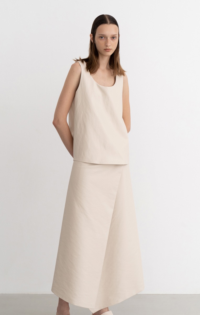 CONNITE ECO LEATHER WRAP SKIRT (IVORY) [6/15 예약배송]